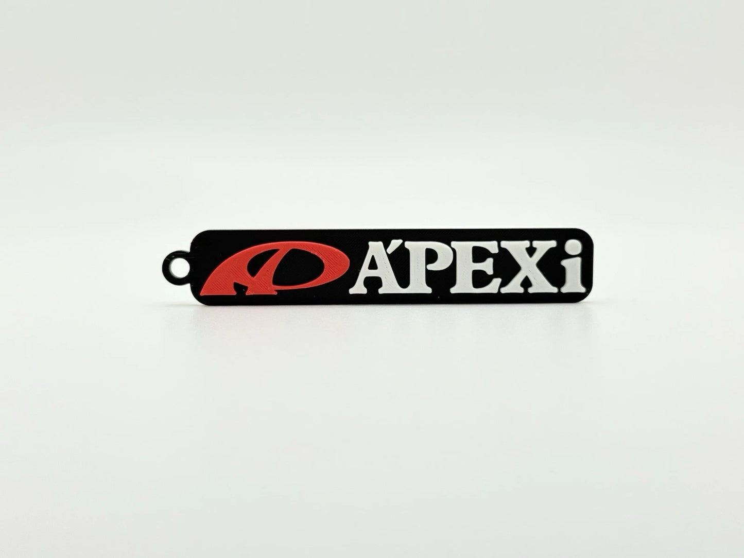 APEXi JDM Keychain – Retro 90s Tuner Logo – Drift & Import Car Accessory