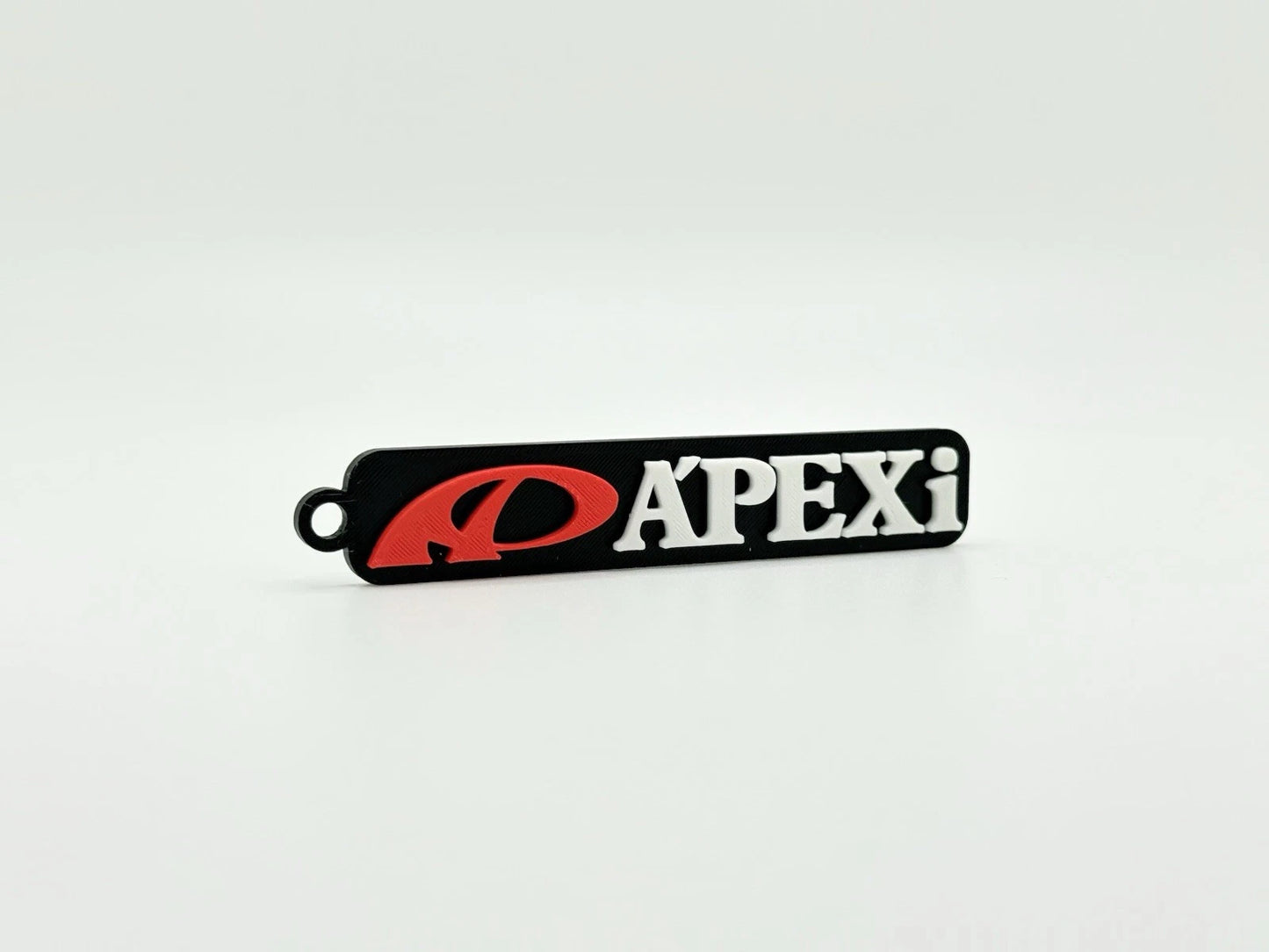 APEXi JDM Keychain – Retro 90s Tuner Logo – Drift & Import Car Accessory